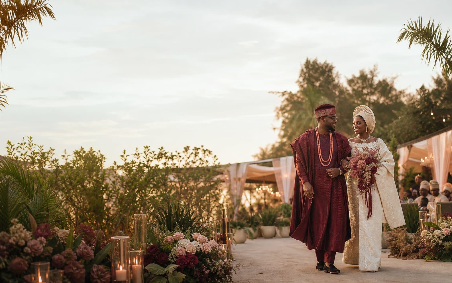Ada and Femi walking together at their garden wedding celebration